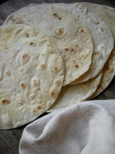 a stack of homemade chapatis