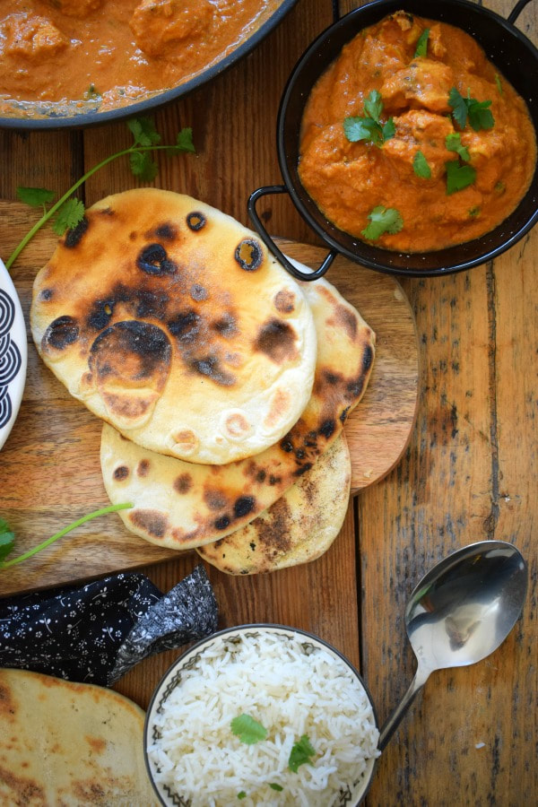 over head view of the chicken tikka masala and nann bread