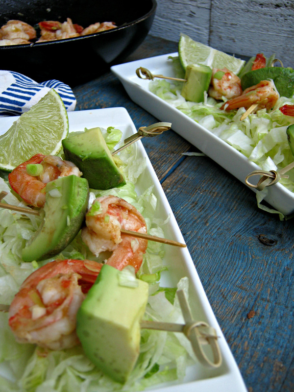 chili lime shrimp and avocado bites on serving dishes