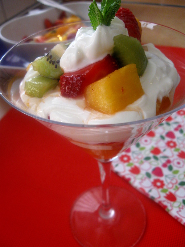 fruit cocktail with yoghurt in a dessert glass