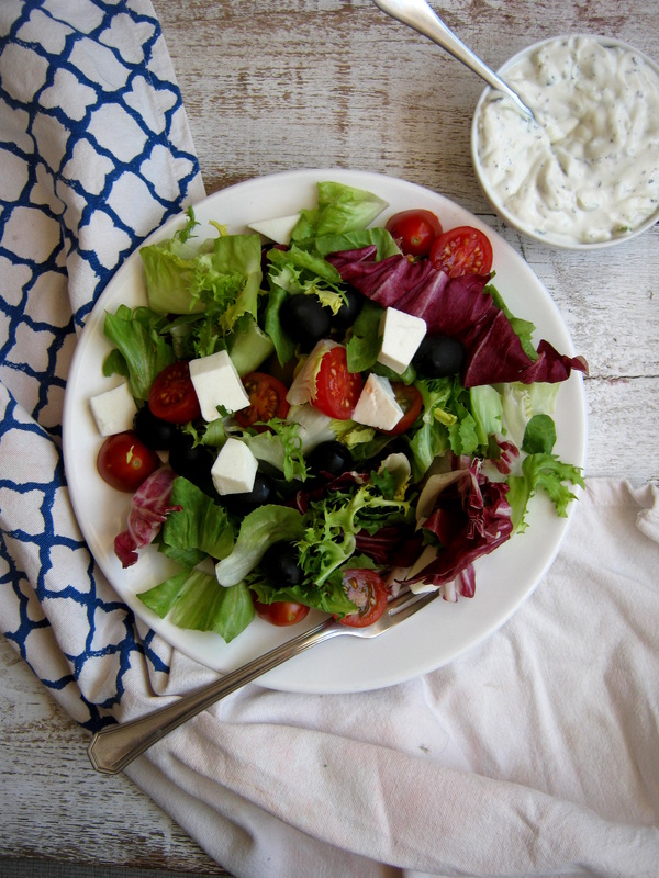 over head table setting view of the Greek Salad with Tzatziki Dressing