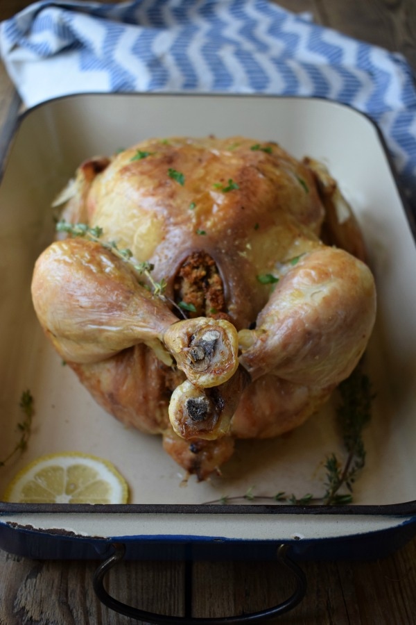 Fresh Thyme & Lemon Roasted Chicken in a roasting dish