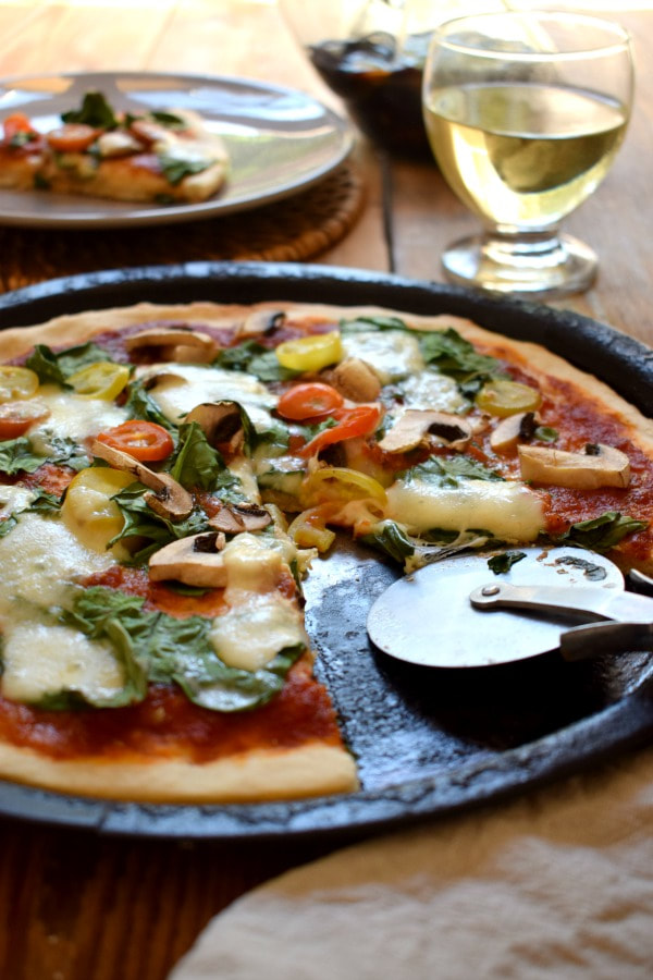 Loaded Vegetable Pizza and a glass of wine