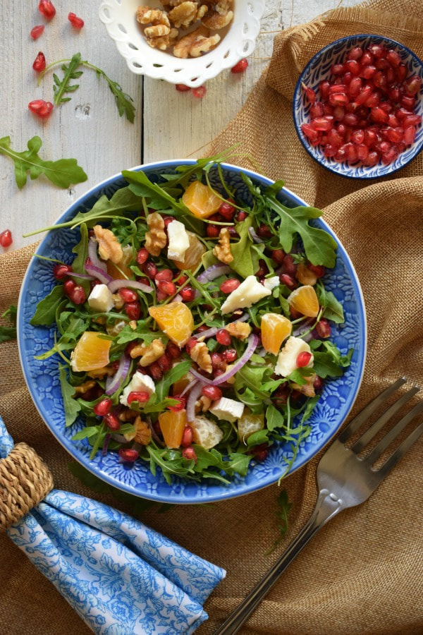 Overhead view of the holiday salad with a napkin and serving fork