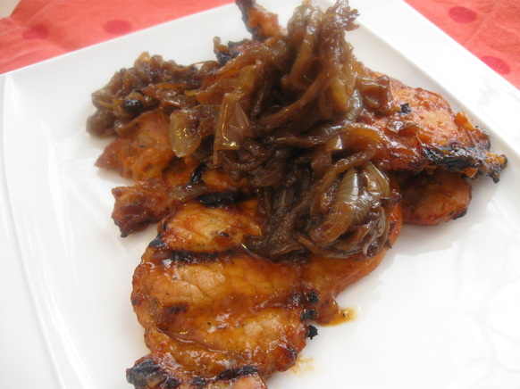 close up of the barbecue pork chops with caramelized onions