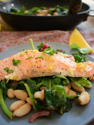 close up of the Lemon Salmon with Sauteed Spinach & Cannelloni Beans