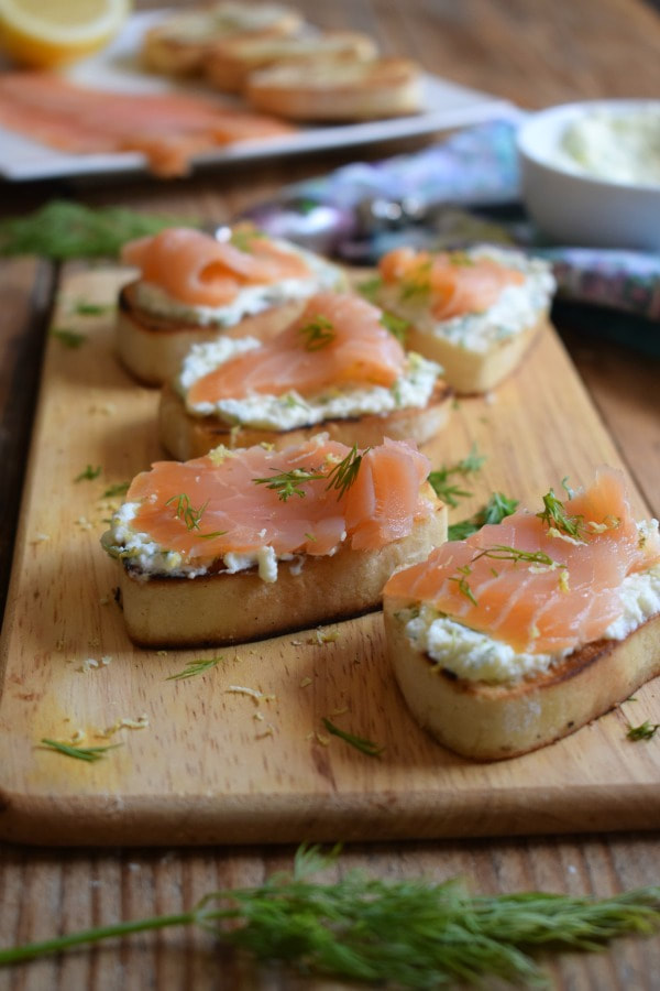 smoked salmon canapes on a board