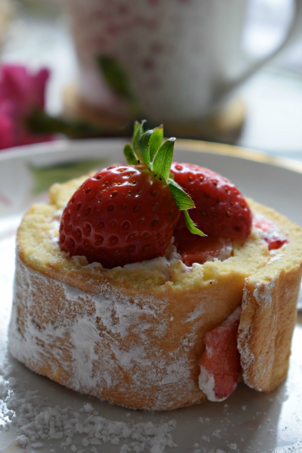 Close up of the Strawberry & Cream Swiss Roll Cake