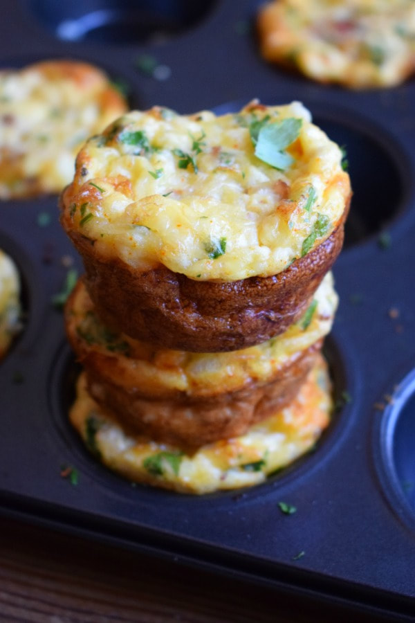 A STACK OF BACON AND EGG BREAKFAST MUFFINS