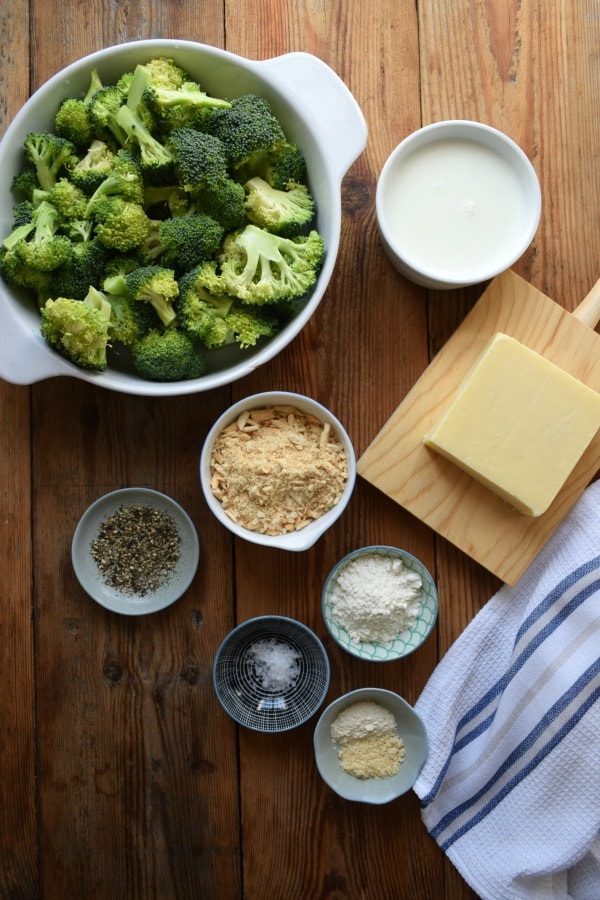 broccoli and other ingredients on a wooden table 