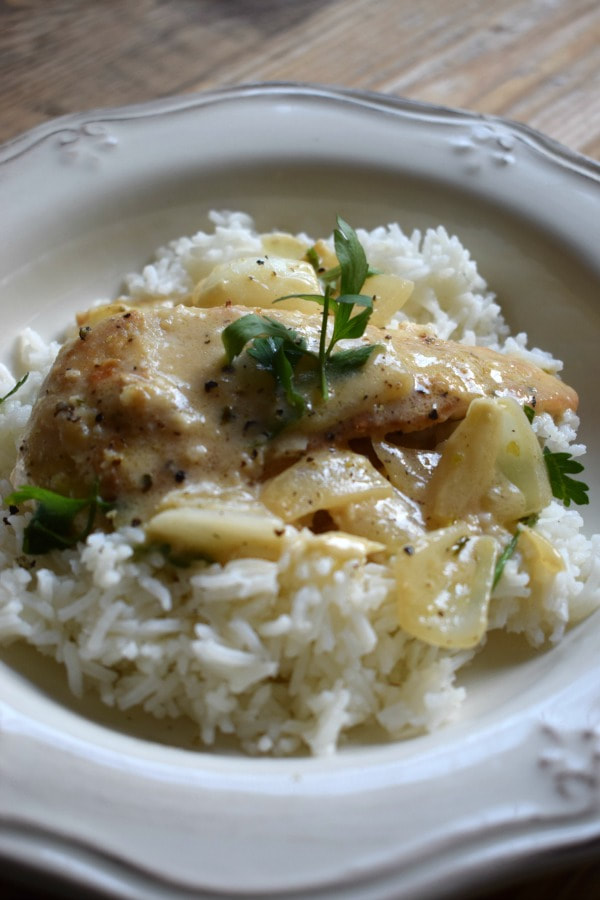  Chicken Marsala with rice in a white bowl