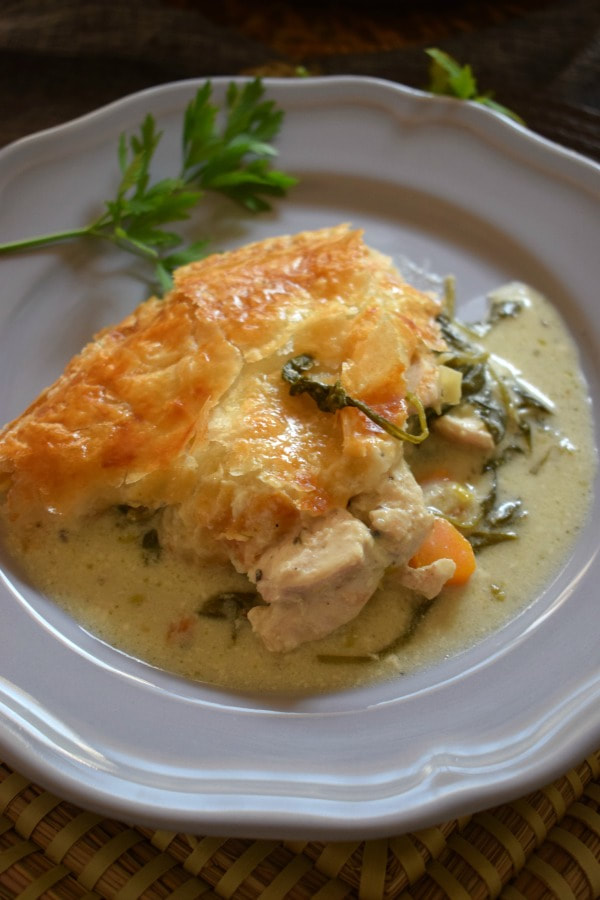 close up of the creamy chicken and vegetable pie on a plate