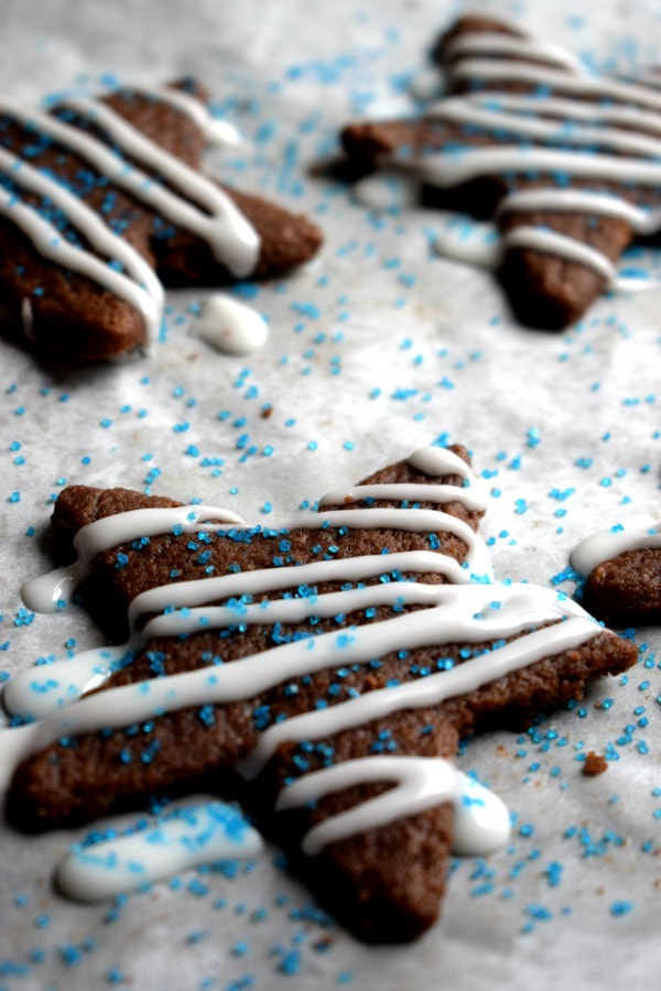 Glazed chocolate shortbread with blue sprinkles