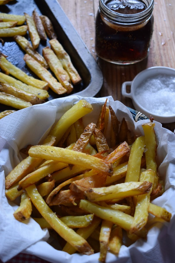 Crispy Oven Fries in a basket with a drink