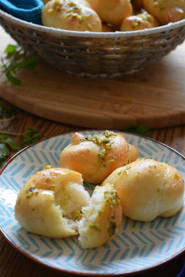 Garlic knots on a blue and white patterned plate