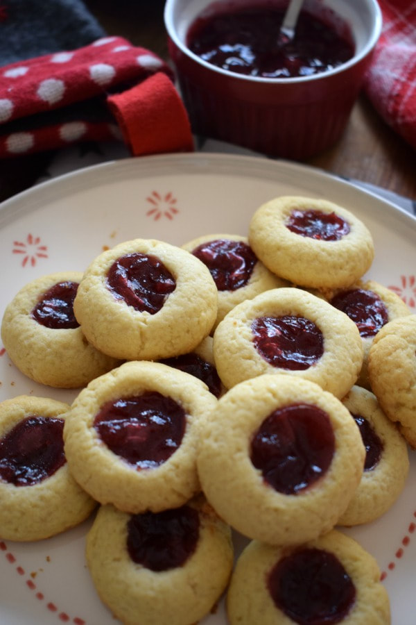 close up of the partridgeberry jam thumbprint cookies
