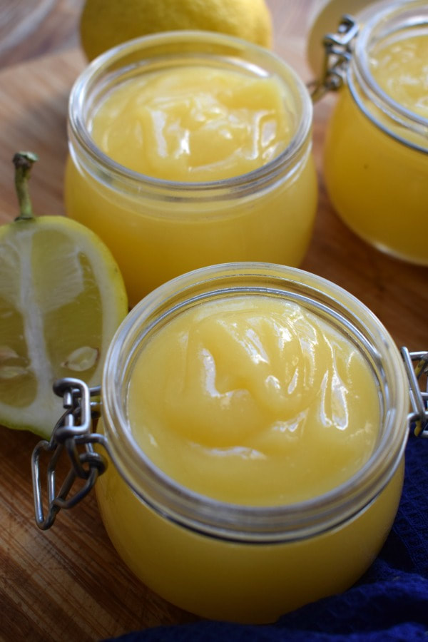 lemon curd in glass jars.  