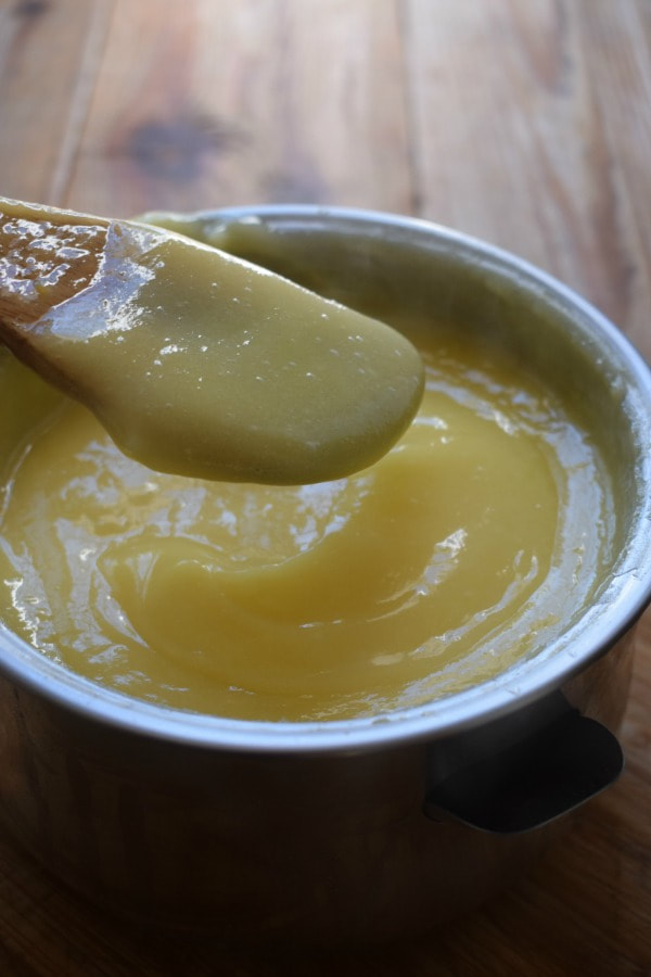 Lemon curd in a small bowl.