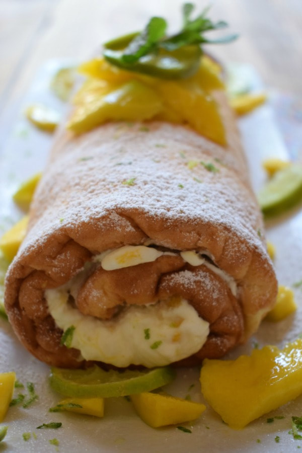 close up of the mango and lime swiss roll cake