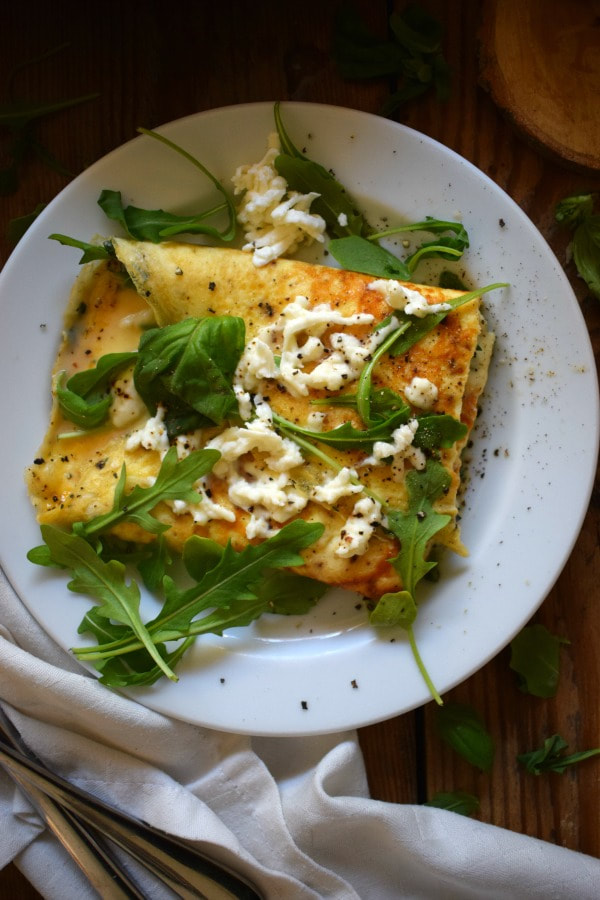 Mozzarella and basil omelette on a serving plate