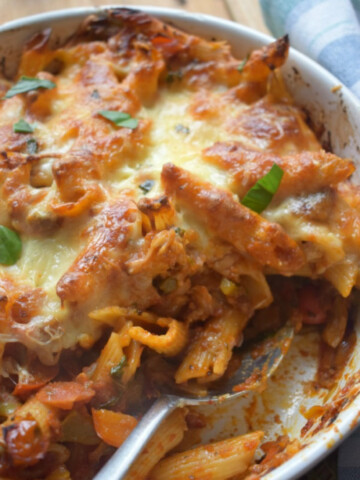 Bell pepper nad bacon pasta bake in a serving dish