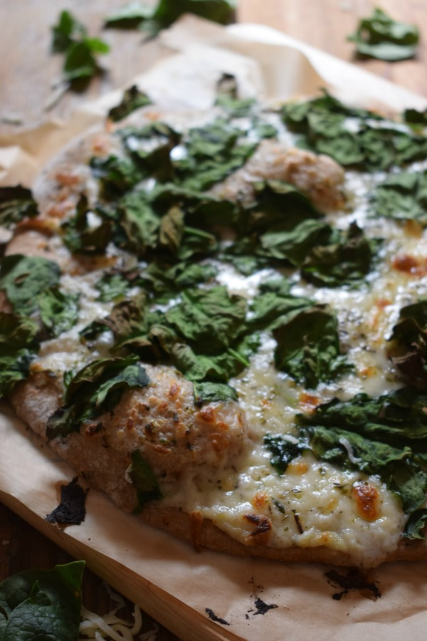 close up of the Spinach & Alfredo Whole Wheat Pizza