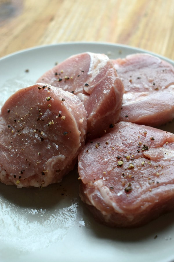 uncooked pork on a plate