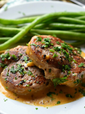Pork Medallions on a plage with green beans