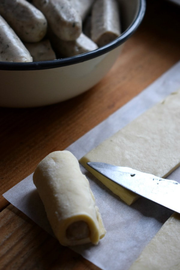 Making sausage rolls.
