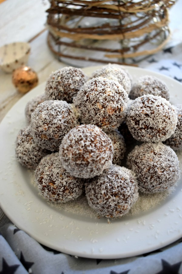 coconut covered cookies on a plate