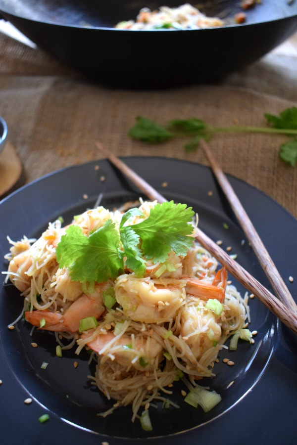 Spicy Shrimp & Noodle Stir Fry on a plate with chop sticks