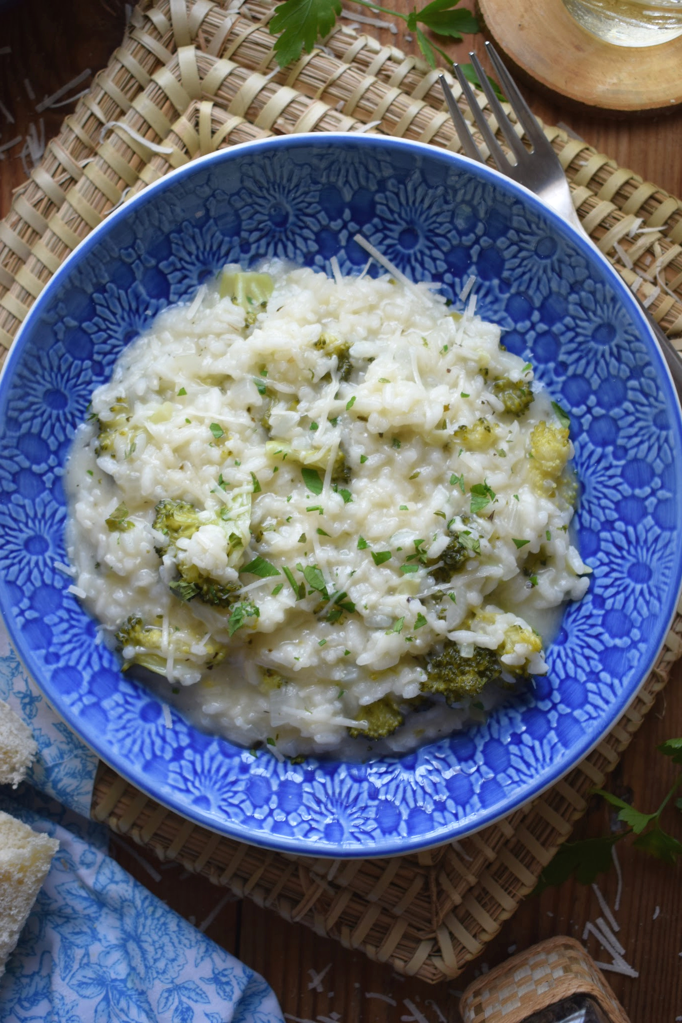 creamy broccoli risotto in a blue bowl