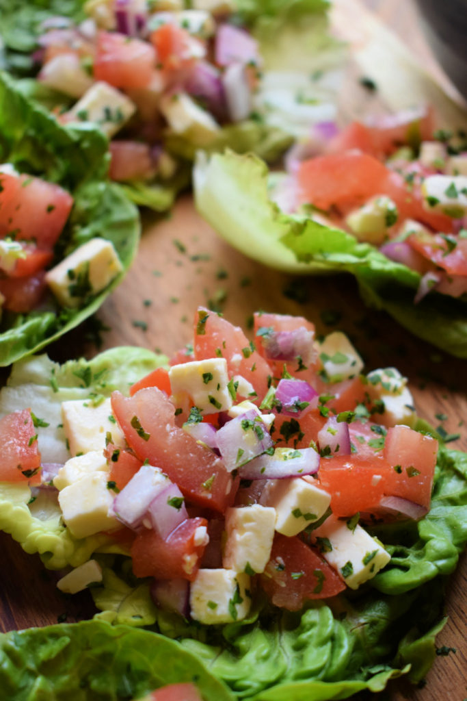 close up of the feta and tomatoa salad cups