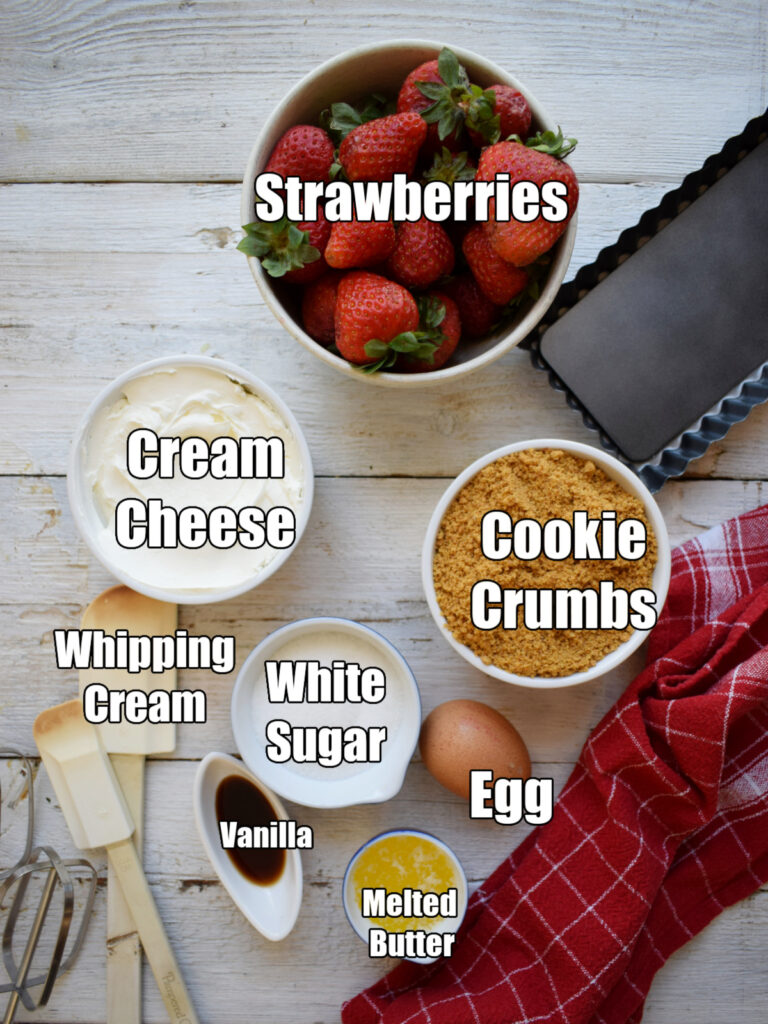 Ingredients to make a strawberry cheesecake tart.