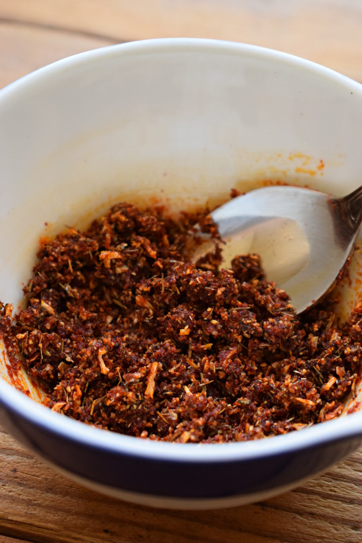 Spice rub in a bowl to make a rotisserie chicken.
