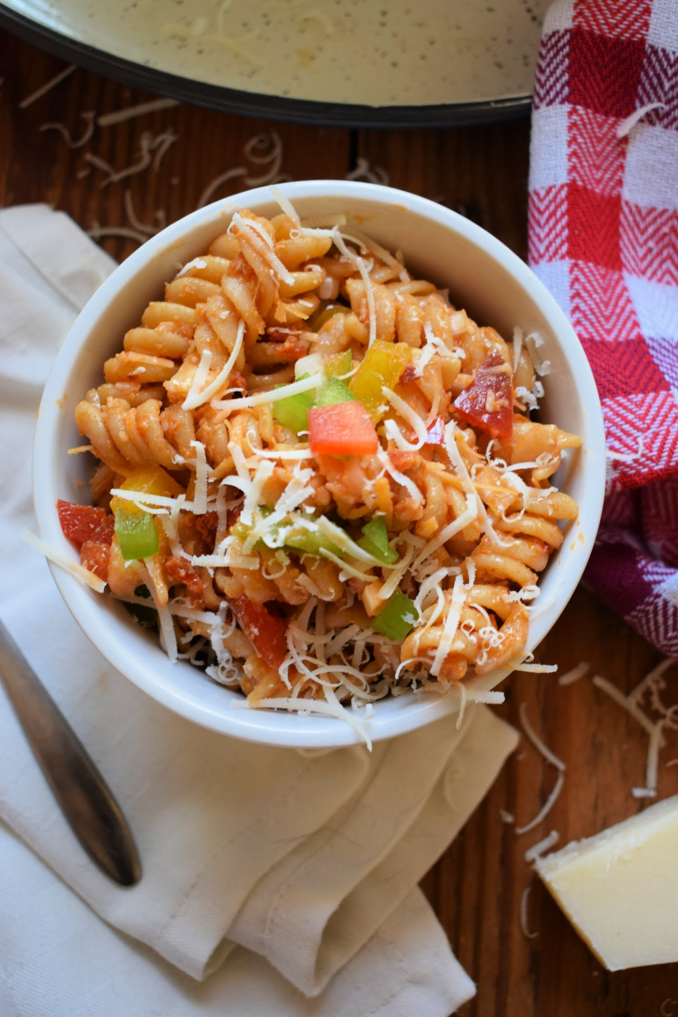 Easy red pesto pasta salad in a white bowl