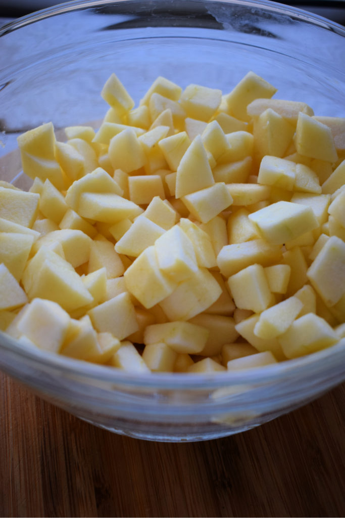 a bowl of diced apples
