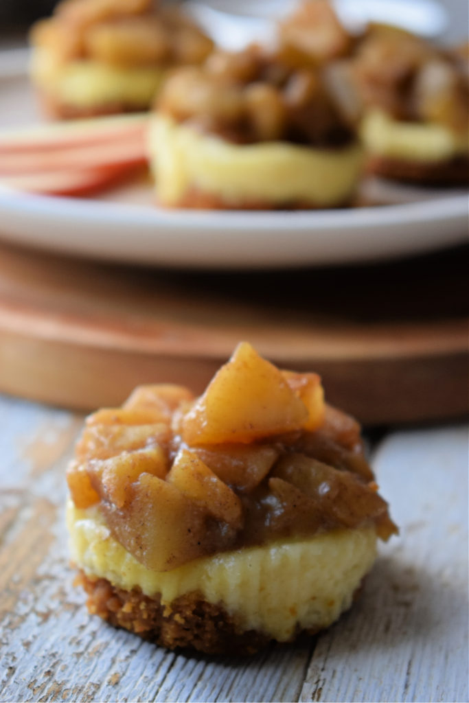 Mini Apple Pie cheesecakes on a serving tray