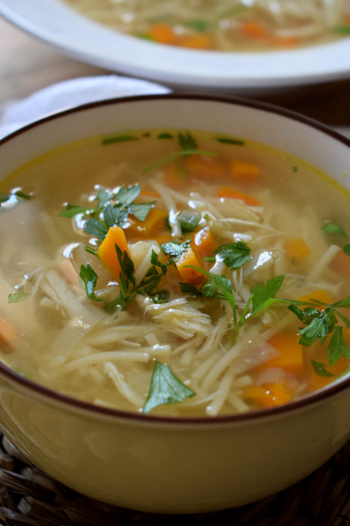 CLOSE UP OF THE SLOW COOKER CHICKEN NOODLE SOUP