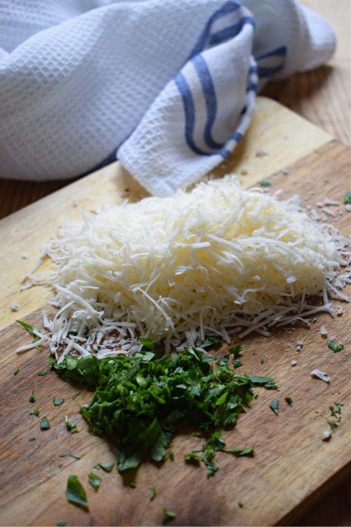 grated parmesan cheese and chopped parsley