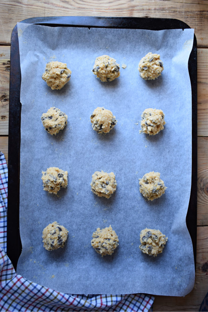cookie dough on a baking sheet to make the chocolate chip oatmeal cookies