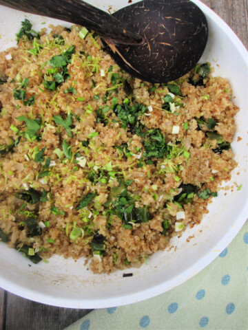 cilantro lime quinoa salad in a white skillet