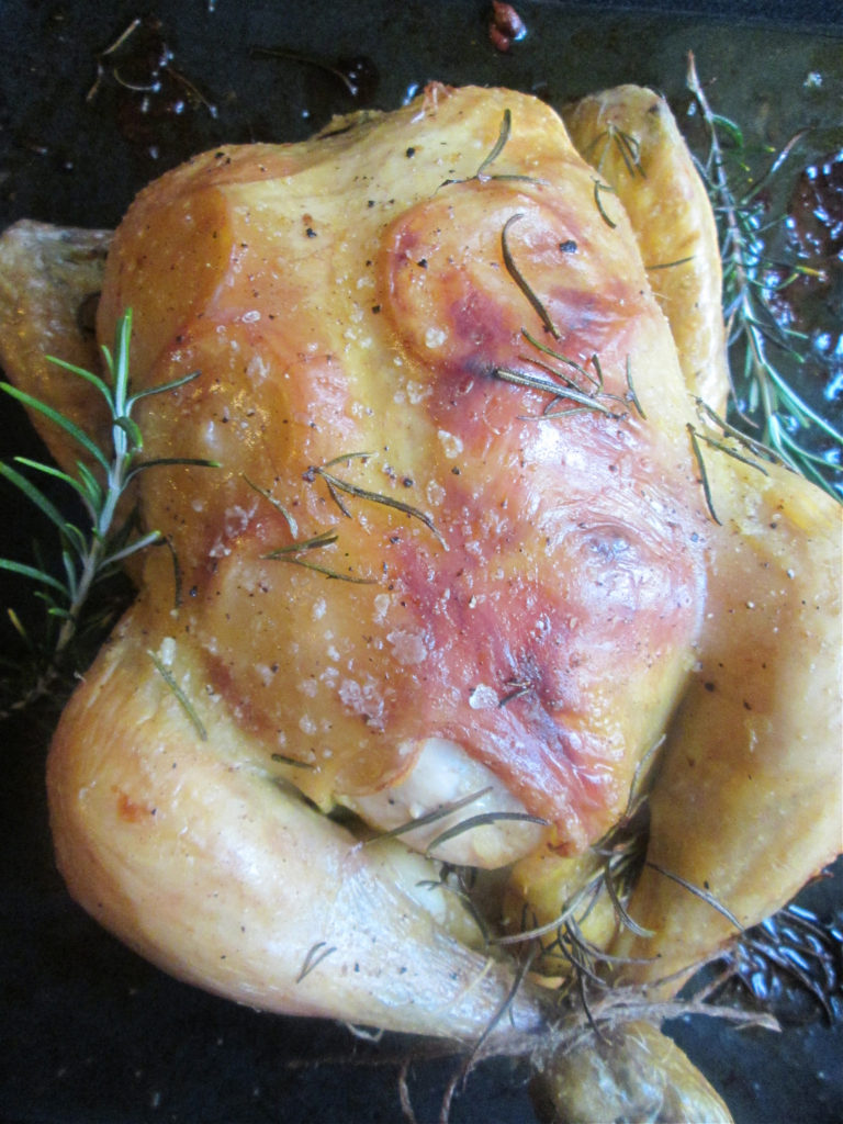 LEMON AND ROSEMARY ROASTED CHICKEN IN A ROASTING TIN