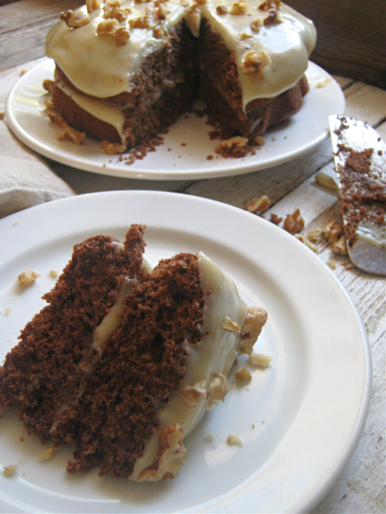 a slice of the caramel chocolate layer cake