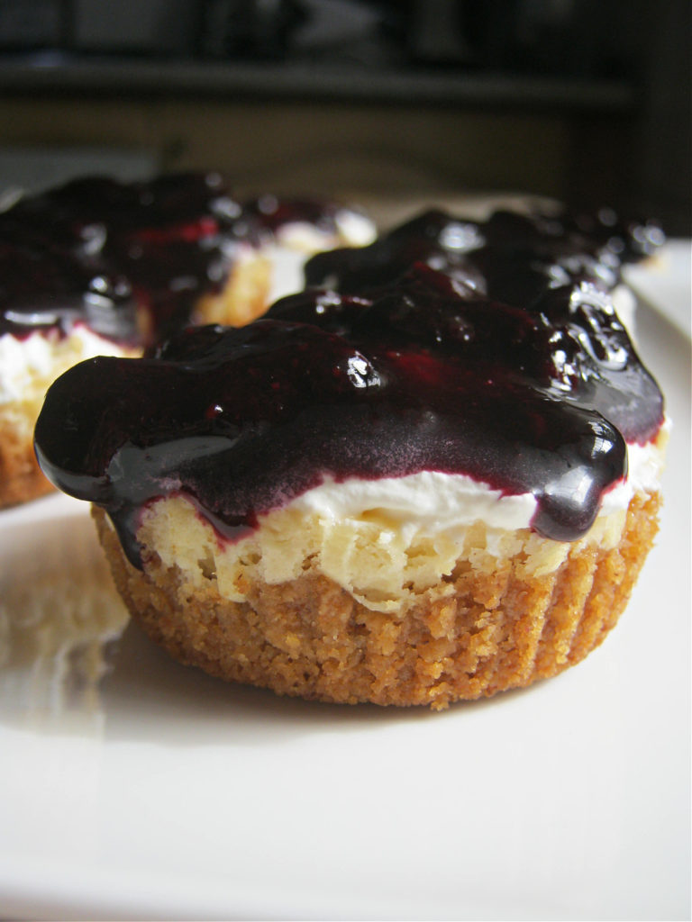 a aclose up of the Mini Blueberry Compote Cheesecakes