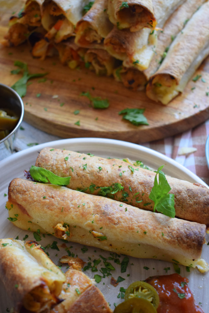 Chicken taquitos on a plate