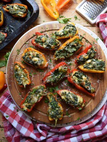 stuffed peppers on a serving tray