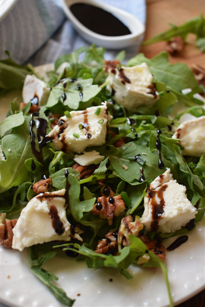 close up of the goat cheese and pecan salad