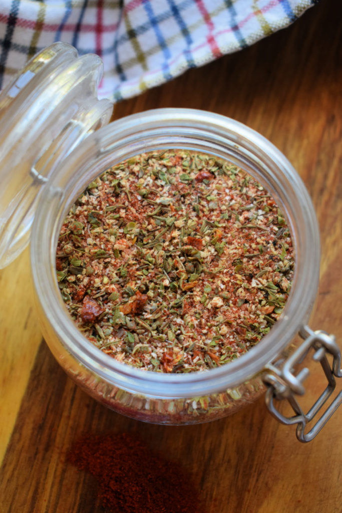 over head view of the cajun seasoning in a glass jar