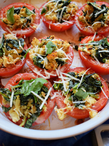 stuffed tomatoes in a serving dish